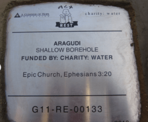 The plaque on the well